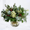 
Celebrate the beauty of the season with the Yuletide Charm arrangement &mdash;
