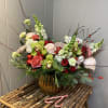 With all it&#039;s glitz and glad, this holiday inspired arrangement is a