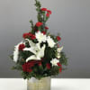 Celebrate your christmas with this prety bouquet of red carnations and white