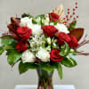 Dozen Deep Red Florals, White Roses and Holiday Greenery and Magnolia Leaves
