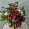 Perfect as a centerpiece, gift, or cheerful surprise, this arrangement delivers classic