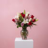 This beautiful arrangement is simple but elegant.  The premium version pictured