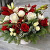 Mixed white and red blooms such as roses, spray roses, amaryllis with