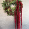  &ldquo;Classic Christmas wreath with rich greenery, pinecones, and a touch of