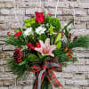 Bring classic holiday elegance into any space with this lush, winter-inspired floral