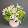 Pure white flowers, in a cylinder vase, are perfect for any occasion
