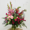 Fresh-picked as if from an English garden, this uplifting vase bouquet features