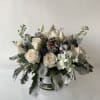 An arrangement of white rose, tulip, and stock in a 5" cylinder