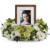 "An exquisite round wreath with blooms inspired by the lasting impressions a