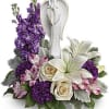 Show your loved ones heart with this magnificent display of roses, lilies