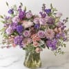 Select our Designer's Choice - Lavender Blooms Bouquet arrangement to brighten your