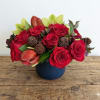 Bold, dramatic, and beautifully refined, Red Symphony is a striking arrangement that