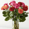  This arrangement features three vibrant hues: orange, pink, and red. 
This