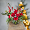 You can't go wrong with Mrs. Clause's favorite flower arrangement. Santa always