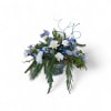 A stunning Hanukkah floral arrangement designed in white and blue in a