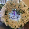 WREATH WITH WHITE ROSES, WHITE CARNATIONS, WHITE CUSHION AND WHITE LILIES
REGULAR PRICE