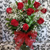  12 Red Roses in a vase with Baby Breath
NOTE: DELUXE PRICE