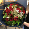 12 RED ROSES with Baby Breath and Gold Ruscus Leaves wrapped in