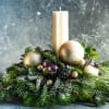 Traditional Christmas Centerpiece classy style made of variety Christmas greens for table