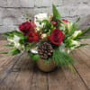 A festive and versatile vase featuring white hydrangea, roses, tulips and alstroemeria