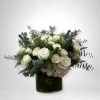 This arrangement comes in a glass round vase, with roses, hydrangea and