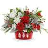 Celebrate the season with Snowy Pines Centerpiece. Bursting with red roses and