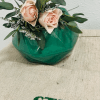 Two petite roses with accent flower, eucalyptus, and tree fern