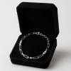 Imported from Peru, this 950-sterling silver bracelet, 5 grams, features a sleek