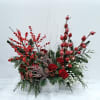 This magnificent arrangement has real pine branches, roses, hypericums, red berries, white