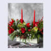 This elegant holiday centerpiece is designed to bring warmth and festive charm