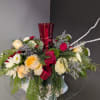 A beautifully selected bunch of the freshest flowers in a vase uniquely