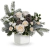 Bring the outdoors in with this forest-inspired bouquet of white roses and