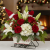 charming and classic holiday centerpiece exclusively from Arden Park Florist. This arrangement