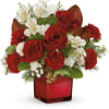 Elevate their holiday spirits with this timeless Christmas carnations bouquet in a