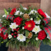 This elongated centerpiece is perfect for any holiday celebration. All the classic