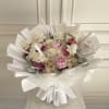 Winter theme bouquet 

Peonies 
Orchids
Roses 
Hydrangeas 

(Glass vase is included with arrangement)