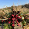 Spread holiday cheer with our Holly Jolly arrangement. Designed in a rustic