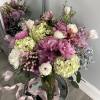 Experience the breathtaking beauty of this grand and elegant arrangement, featuring a