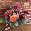 This beautiful bubble vase features our house rose." The Free Spirit rose.

Please