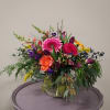 Vibrant roses, bright gerbera daisies and spring flowers! Guaranteed to bring smiles.

Please
