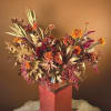 Dried floral arrangement, as pictured, featuring autumnal colors and materials. Dried flowers