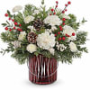 This Christmas bouquet carries your best wishes for a joyful holiday season