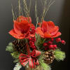 Golden birch branches accent natural birch container.  The red tone amaryllis