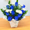 Striking bouquet of fresh blue roses, beautifully arranged to create a bold