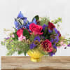 Our luxurious holiday collection featuring lush premium jewel toned florals. This arrangement