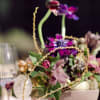 Designed especially for social dinner tables, this arrangement creates an inviting atmosphere