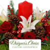 A festive, seasonal centerpiece thoughtfully designed by our florist using fresh holiday