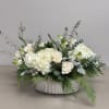 Beautiful combination of white Hydrangeas, Roses, Lisianthus, Star of Bethlehem, Veronica and