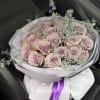 Soft, refined, and effortlessly elegant, this arrangement features premium lavender roses carefully