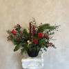 Perfect holiday centerpiece, in a ceramic vase with red roses, fresh pine